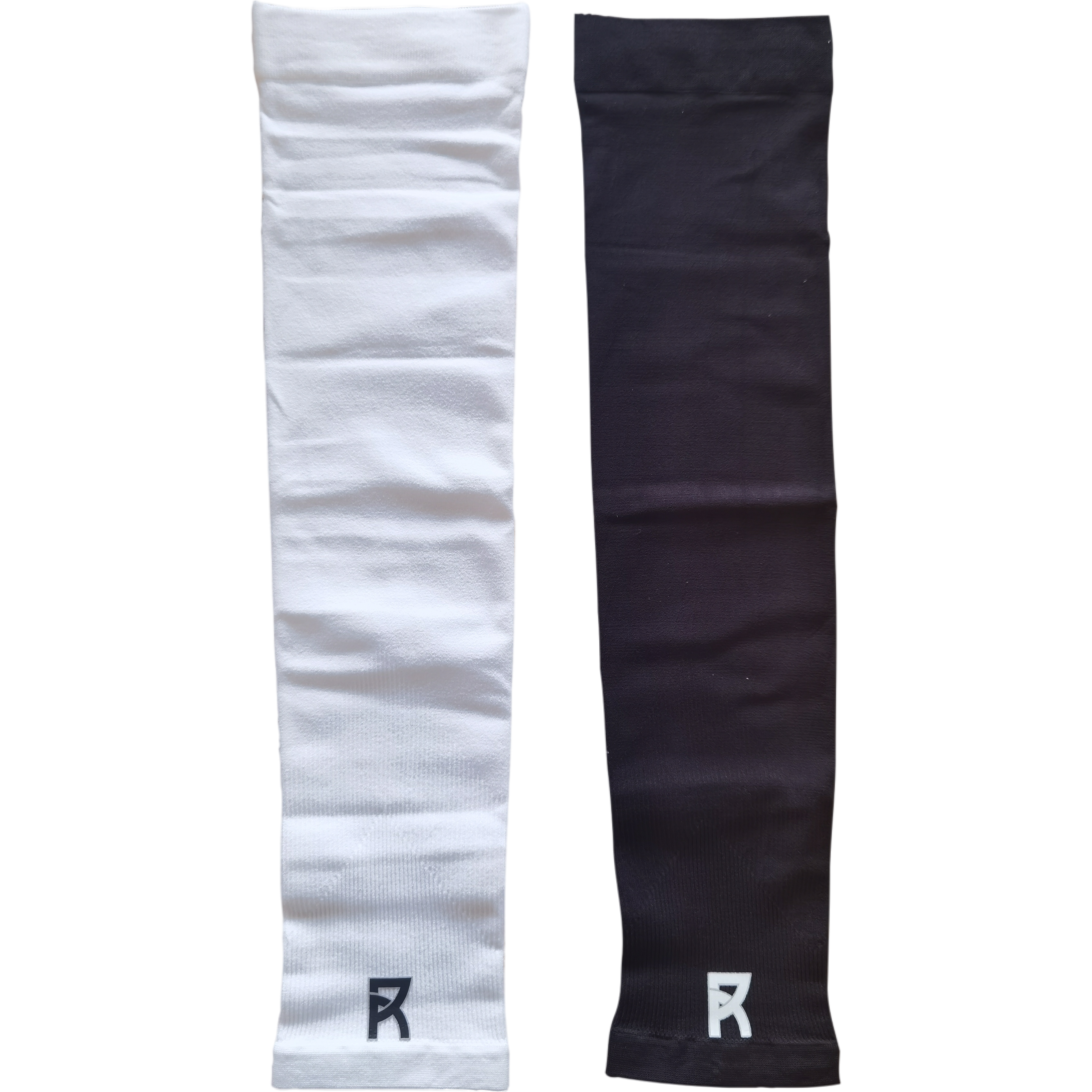 Pair of Reyrr Compression Arm Sleeves in white and black, breathable and elastic for UV protection and sweat wicking