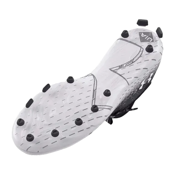 White UA Spotlight LUX MC 2.0 cleat with black bladed and conical studs for multidirectional traction.